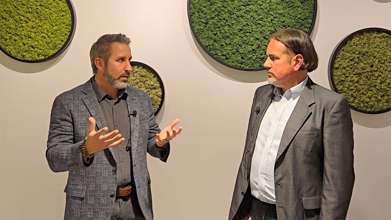 Eric Murphy, left, speaking with Brian Orelli at Alterome’s office