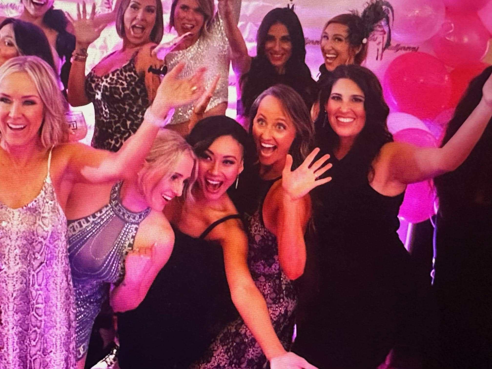 A lively group at the Bubbles and Ballgowns fashion fundraiser