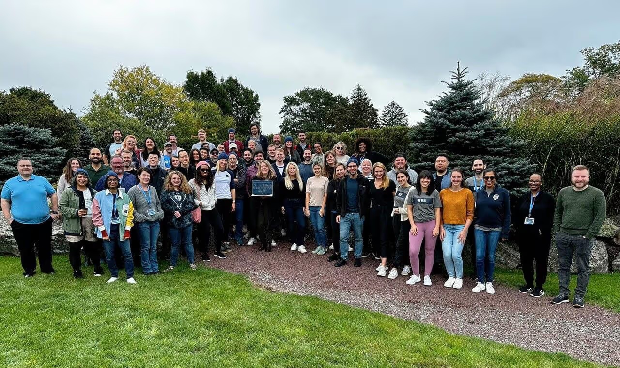 Healthie team members gathered outdoors for a company group photograph