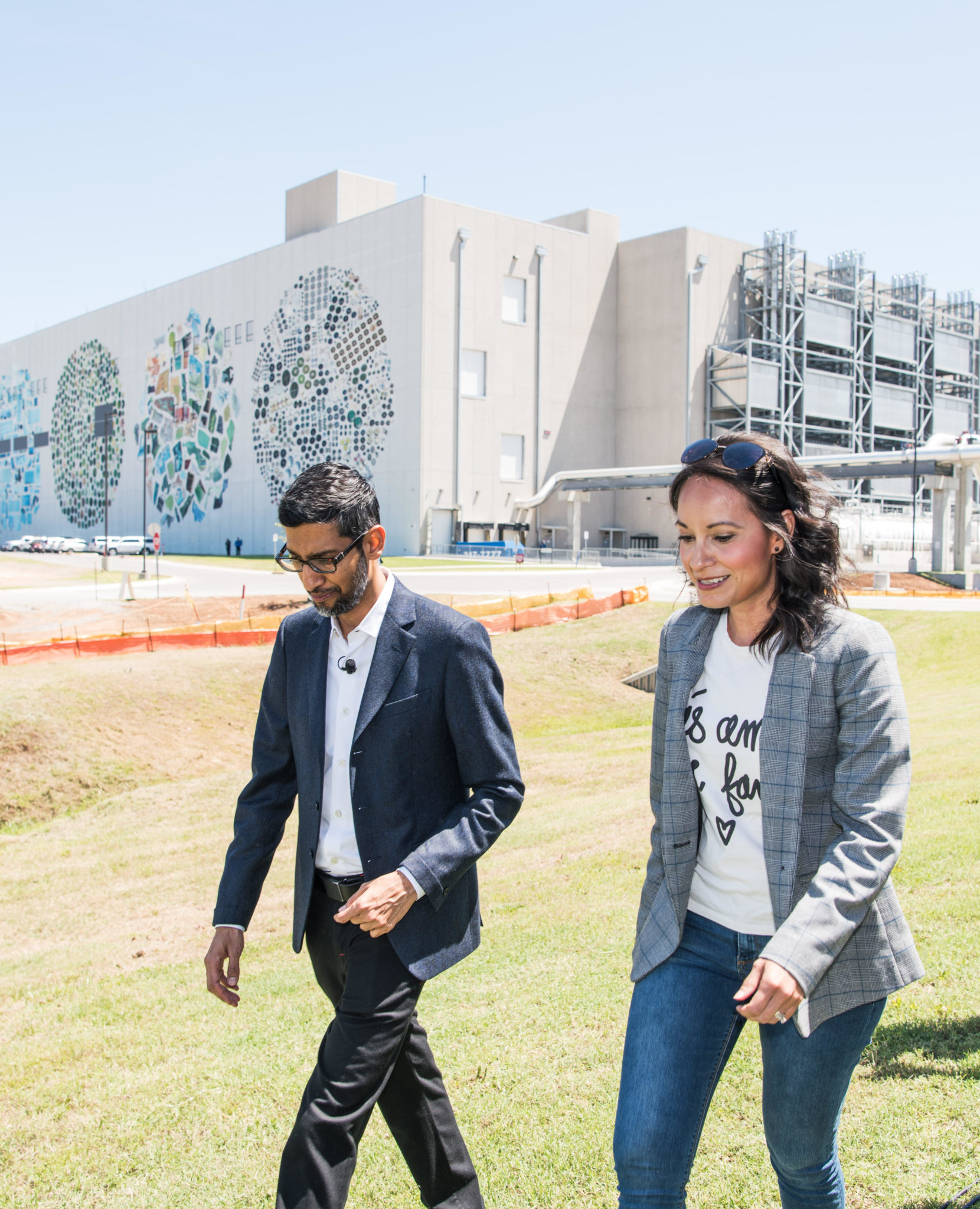 Erika Lucas standing with Google CEO Sundar Pichai