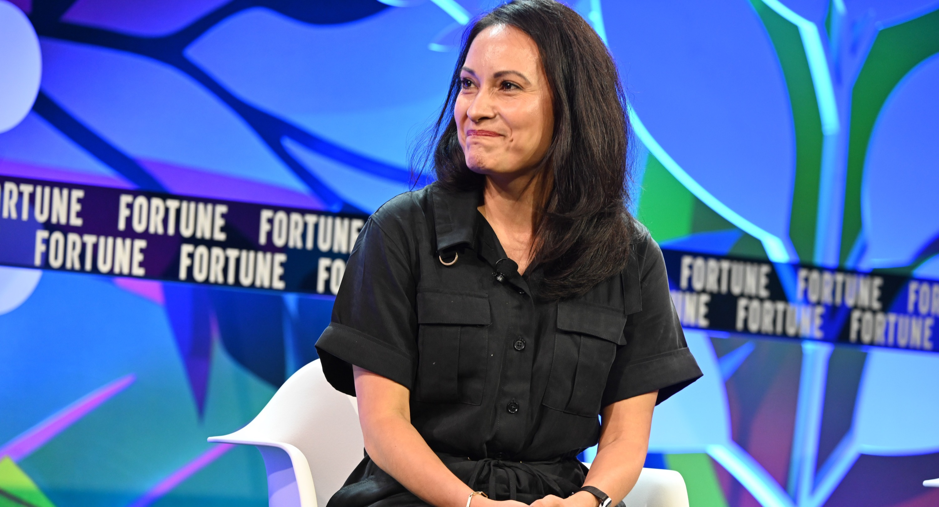 Erika Lucas seated onstage at a Fortune event