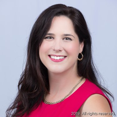 A 2019 professional portrait of Erin Stinner