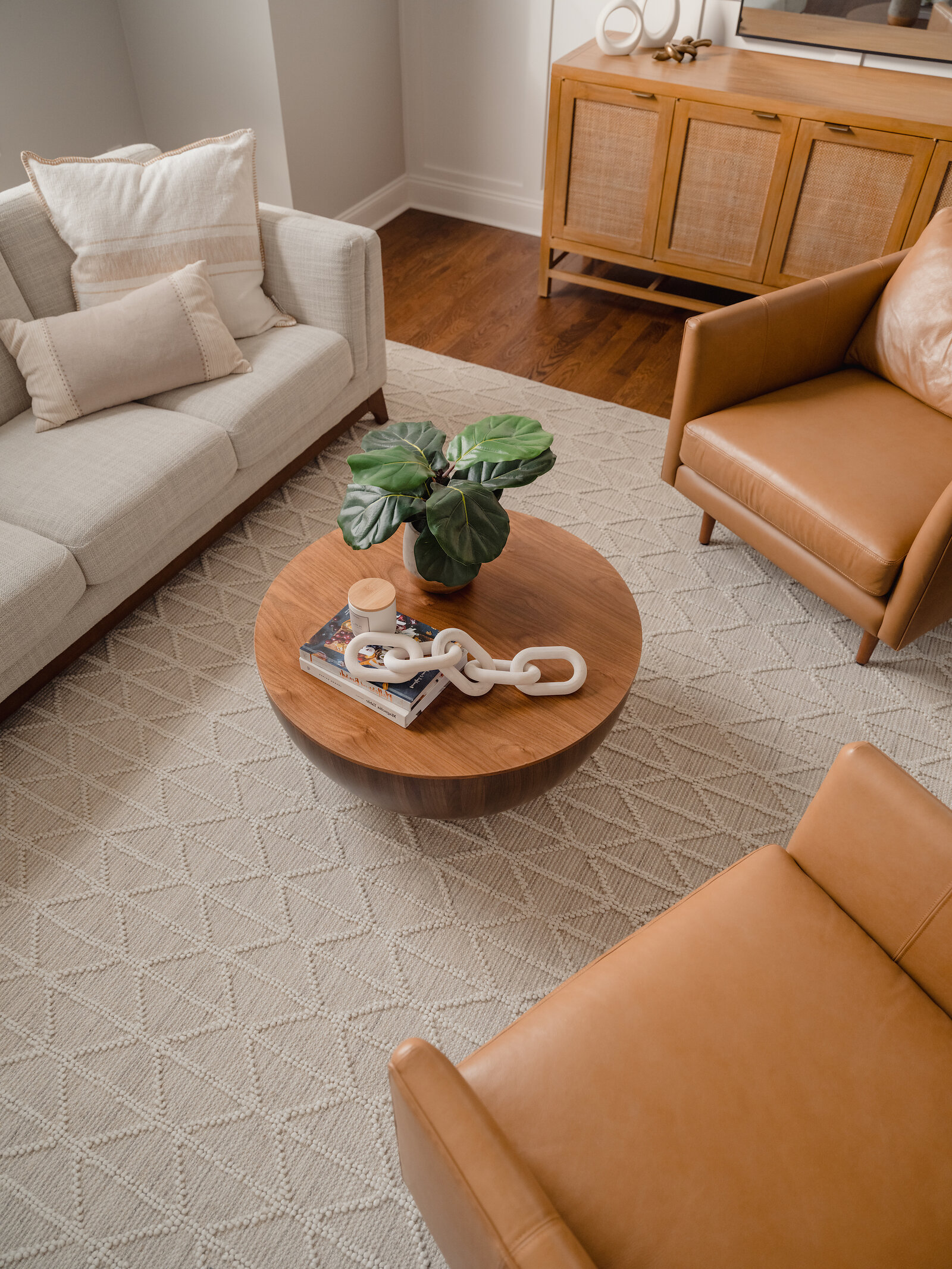 An Ernesta Odessa rug in Oatmeal grounding a furnished living room