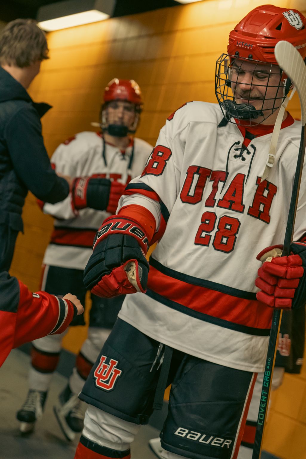 Ethan Noonan in his number 28 University of Utah hockey uniform