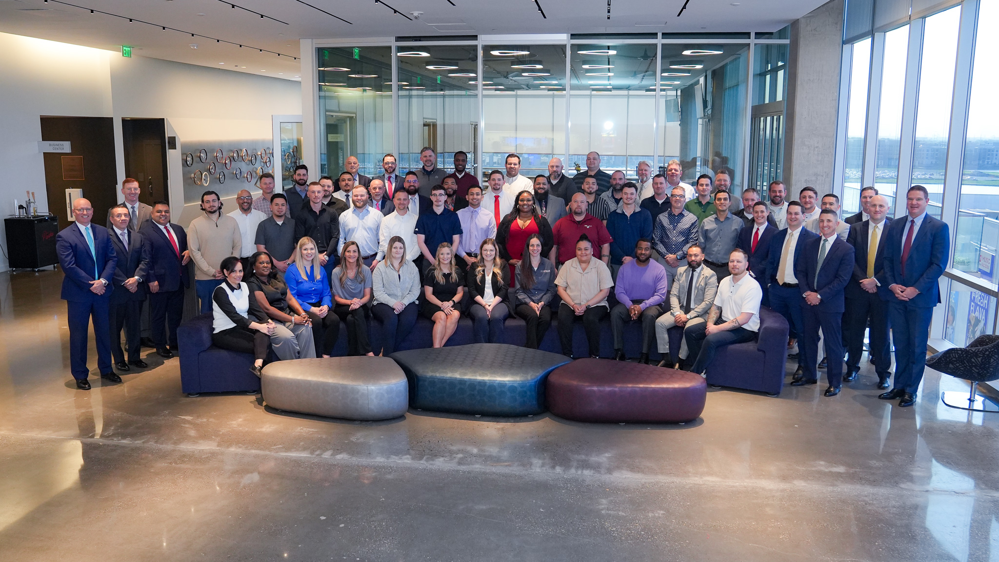 Group posing together in a photograph published on Ethos Group’s learning page