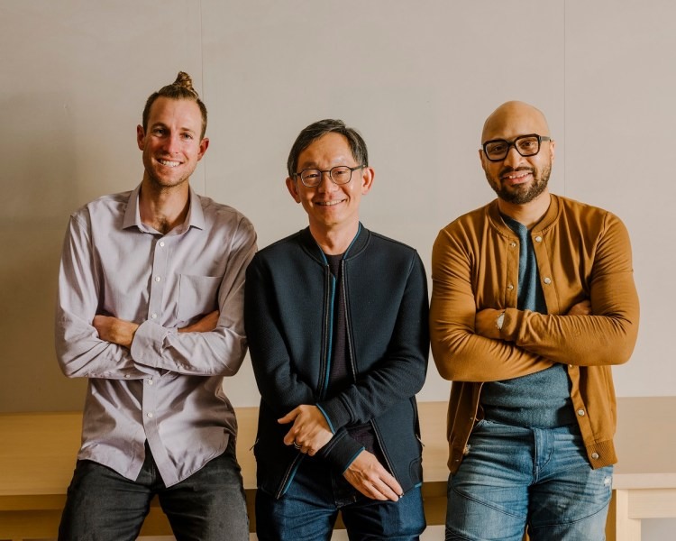 Evan Cheng standing between two Mysten Labs colleagues