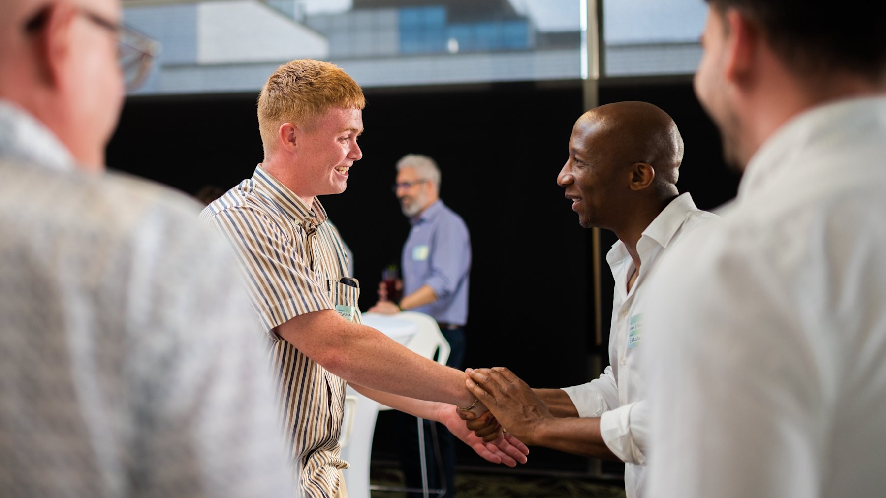 People greeting each other at an Everlaw company event