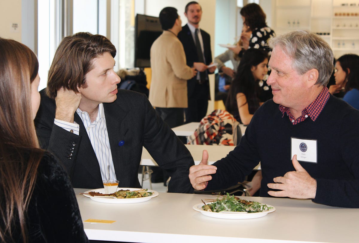 Evin Ollinger in conversation with another participant at the Nasdaq Entrepreneurial Center