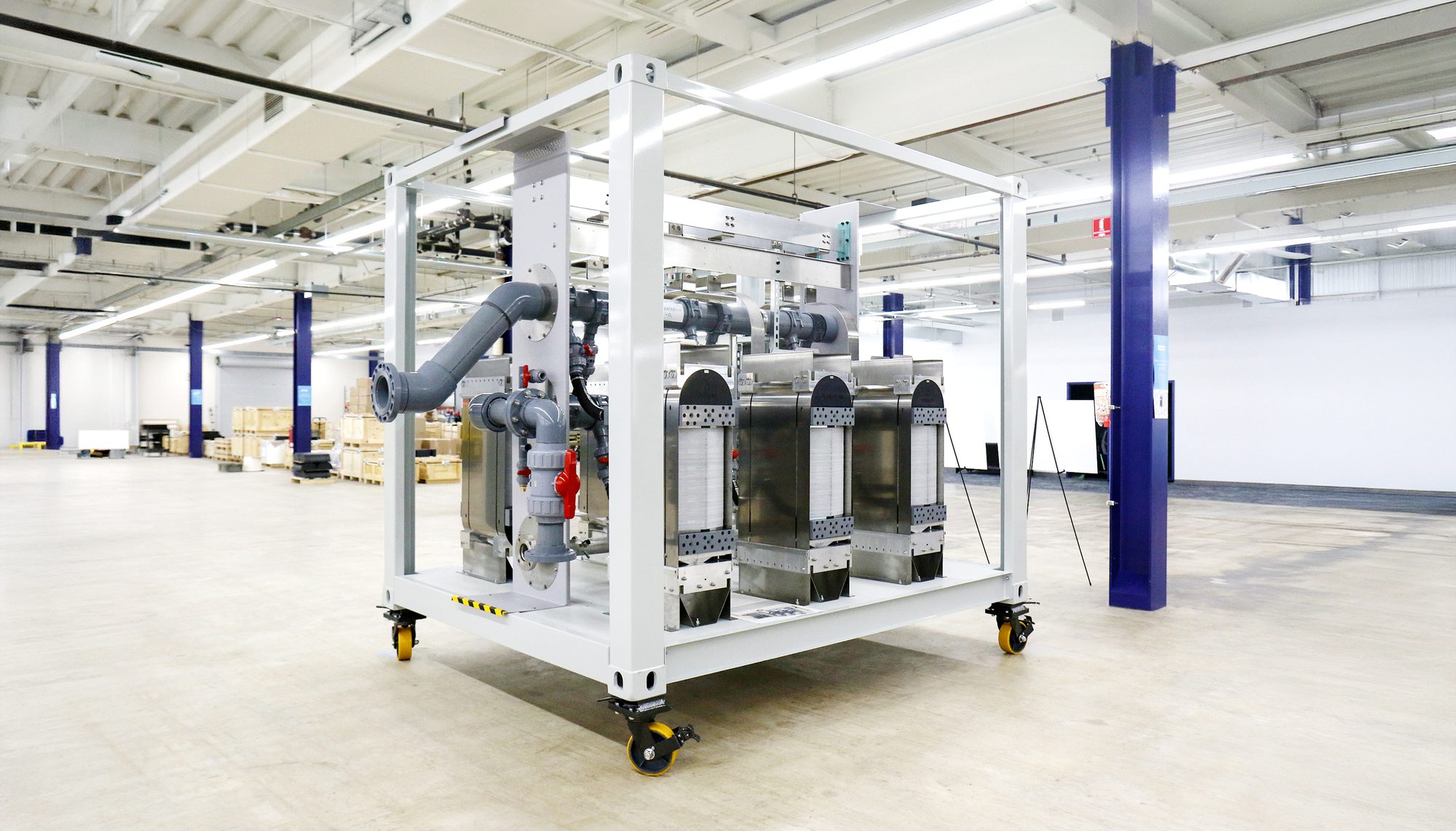EVOLOH electrolyzer stacks installed in a white industrial test frame