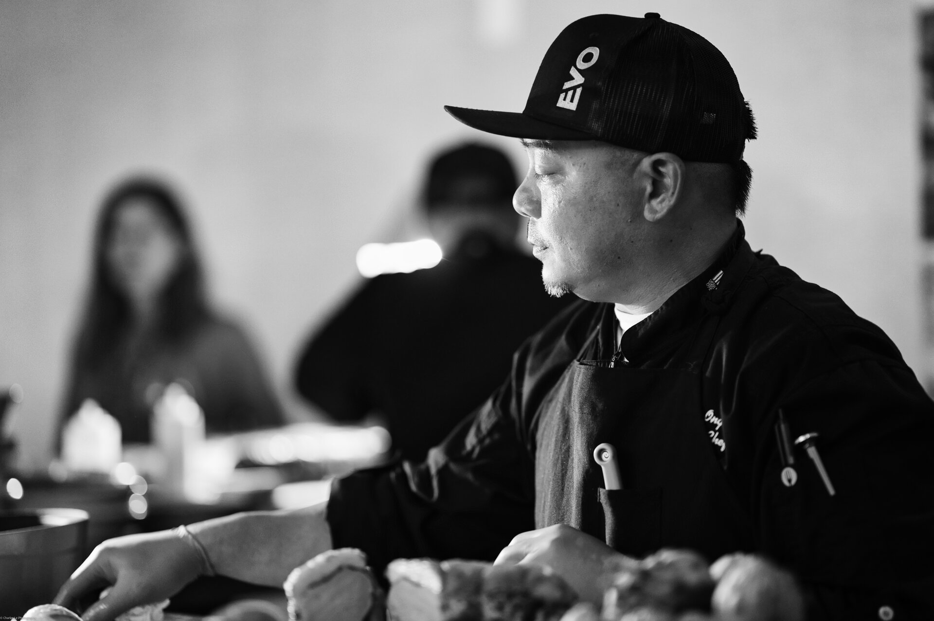 A culinary professional at work in a commercial kitchen