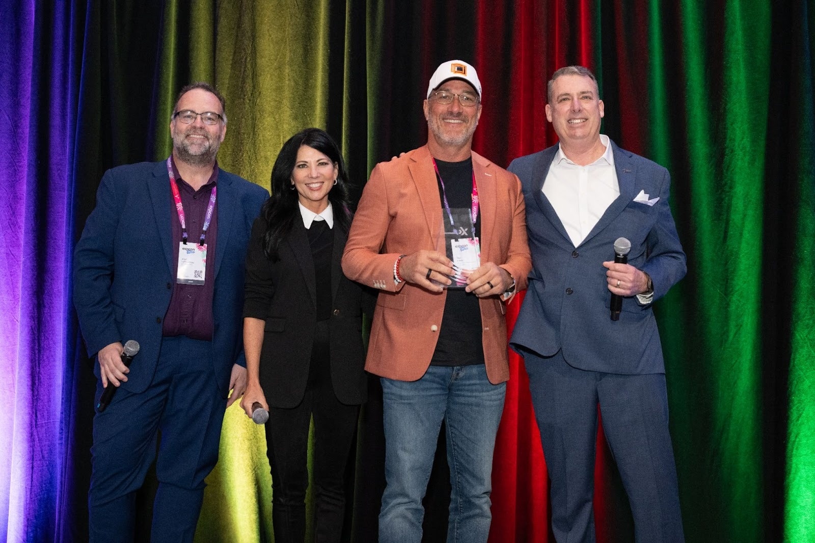 Commercial brokerage participants celebrating an award at eXpCOMMCON in Miami