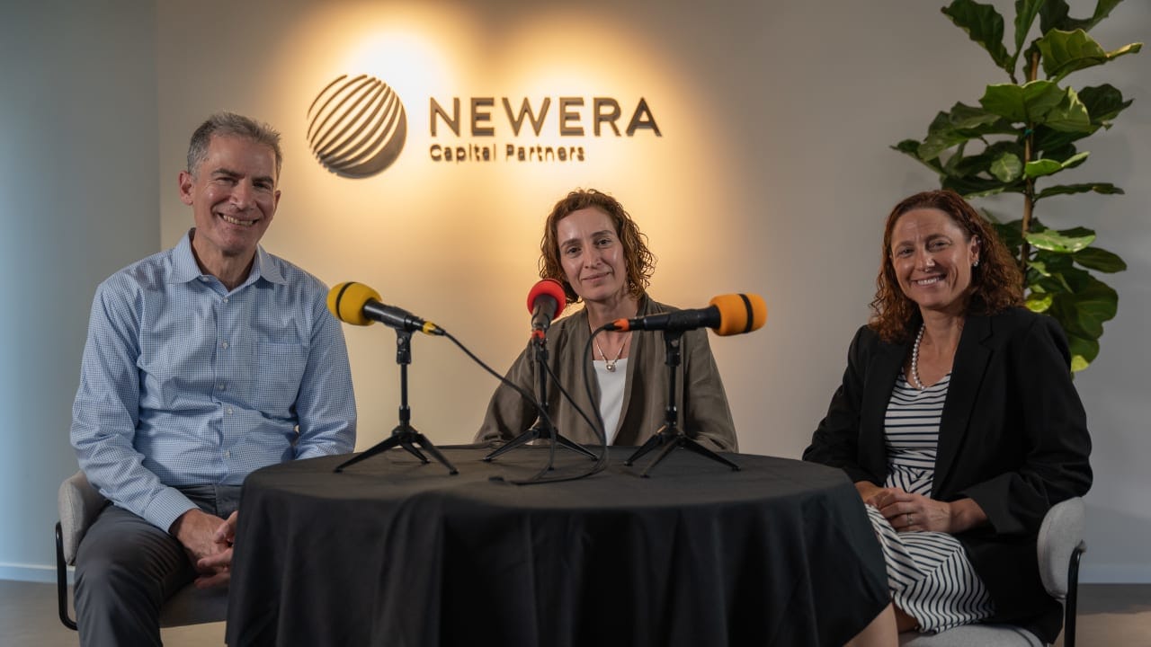 Eynat Guez seated between Gideon Argov and Maayan Hoffman at a podcast recording