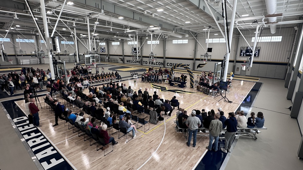 District photograph accompanying the Falcon Fieldhouse grand-opening announcement