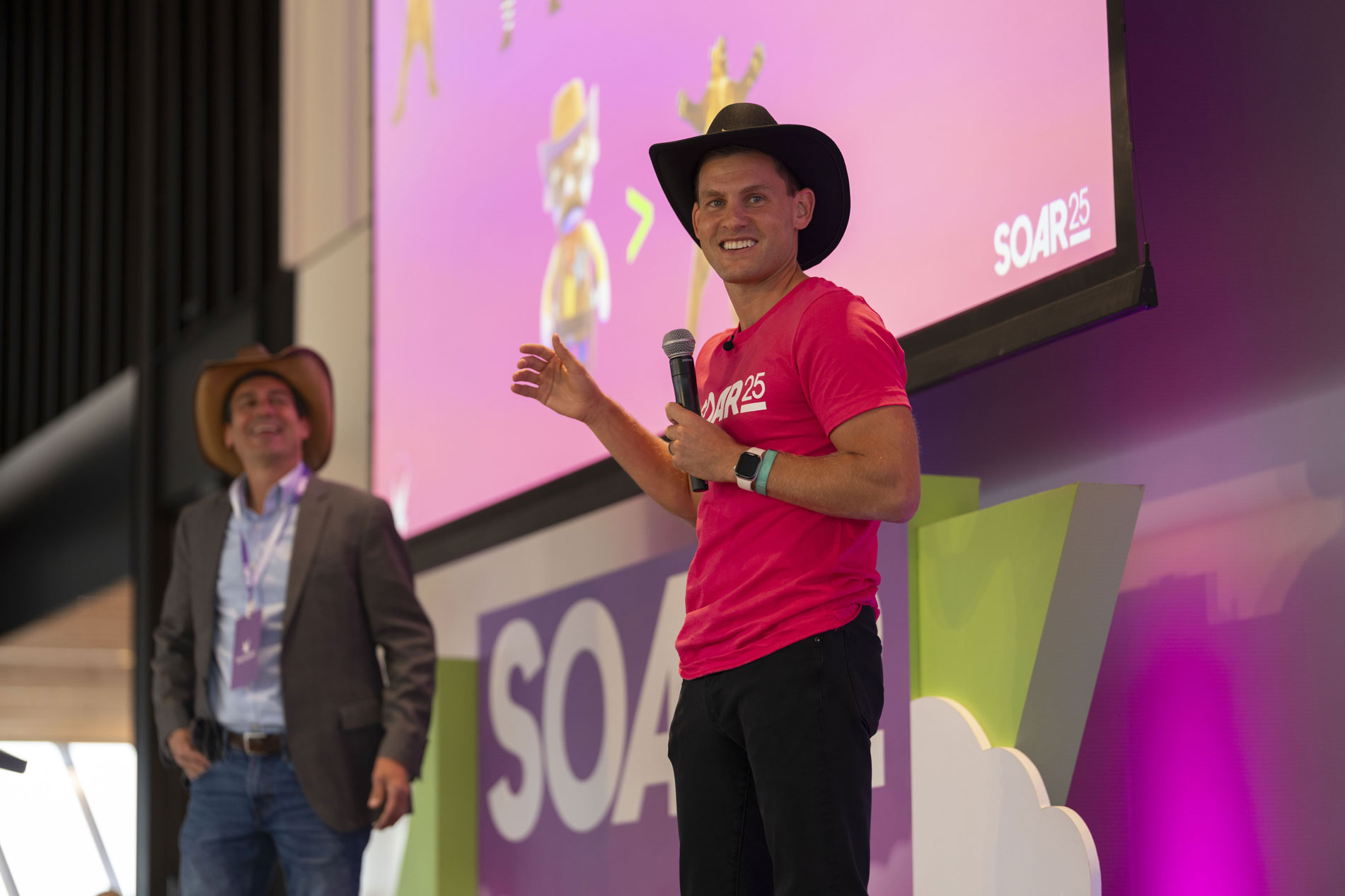 Fairmarkit leaders onstage at the Soar 2025 company event