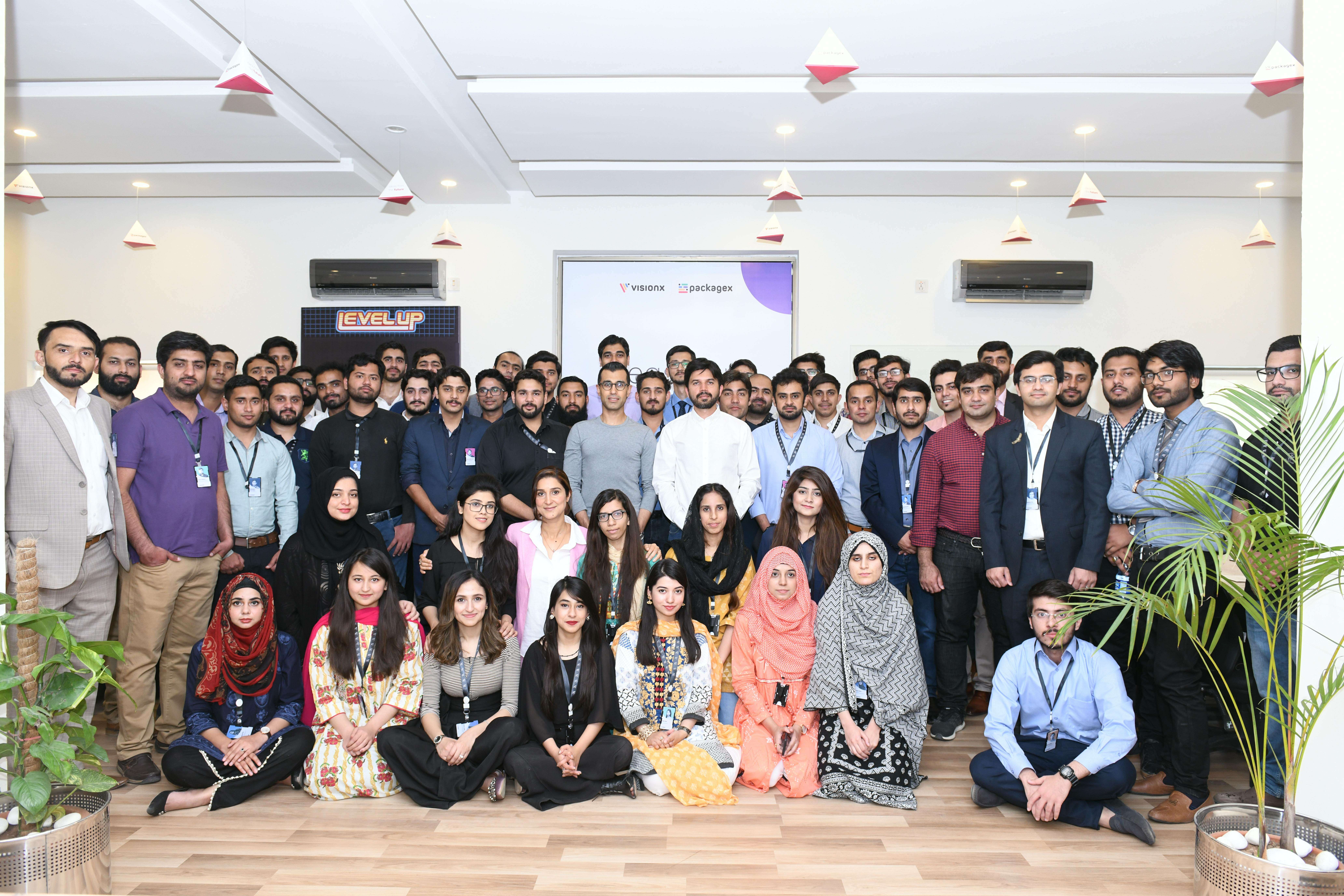 Farrukh Mahboob with the VisionX and PackageX team at the Islamabad office