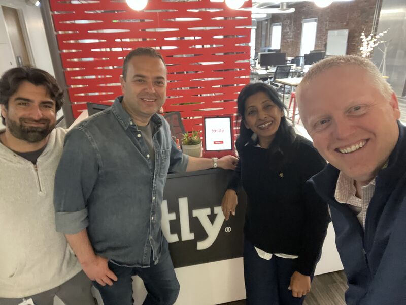 Fastly employees gathered in a company office