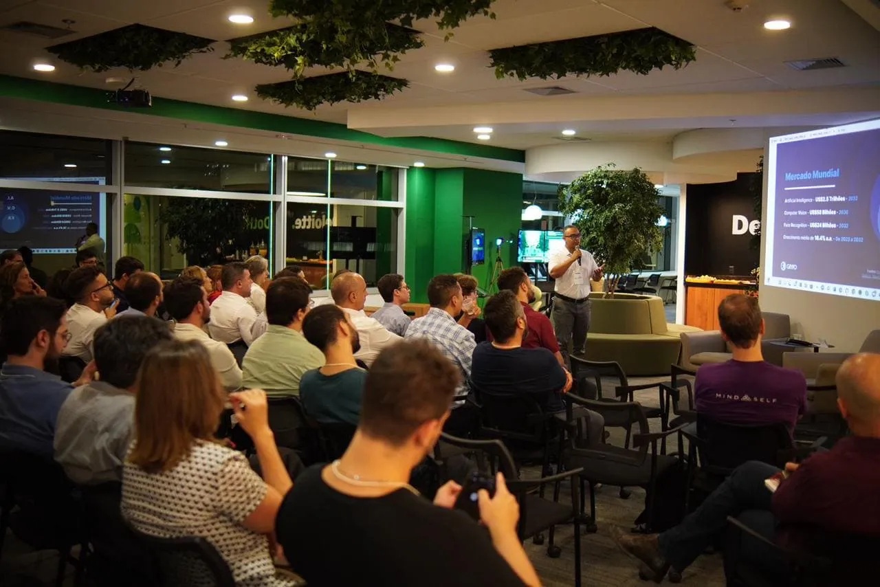 An audience listens to a presenter at a FEA Angels event