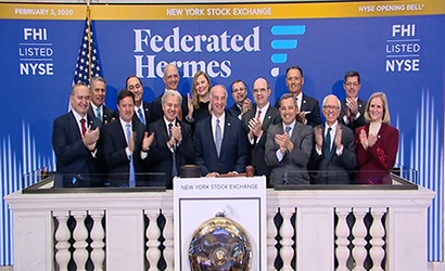 Federated Hermes representatives applaud at the New York Stock Exchange during the 2020 rebrand celebration