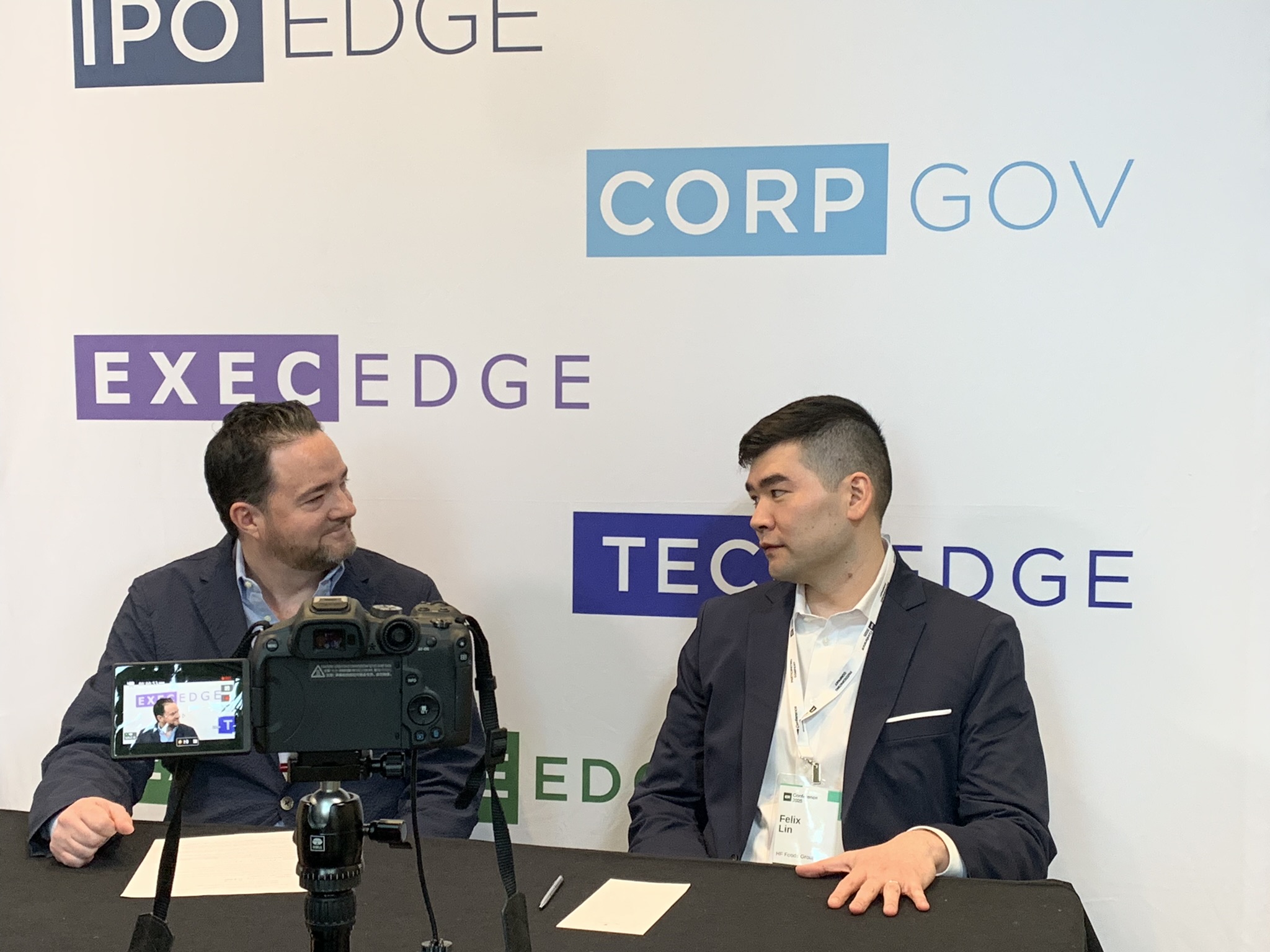 Felix Lin, right, speaking with Jarrett Banks during an interview at ICR Conference 2025
