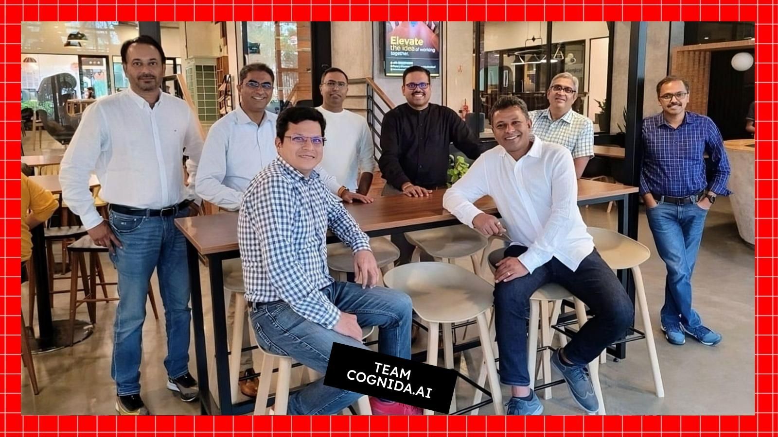 Feroze Mohammed, second from left, with members of the Cognida.ai team around a table