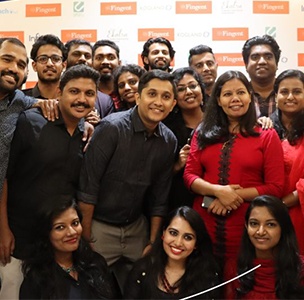 Fingent employees posing together in a company photograph