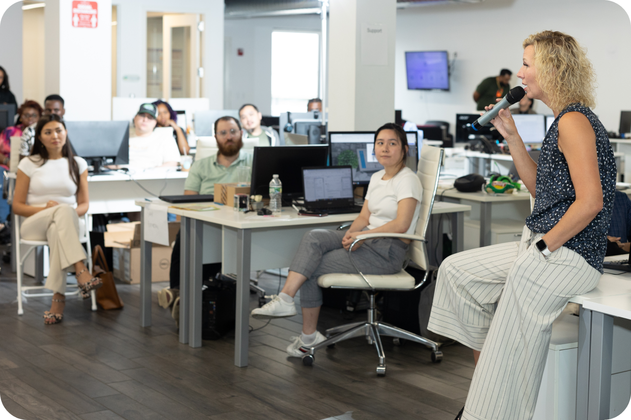 Fingercheck team members gathered in the company's office for a talk