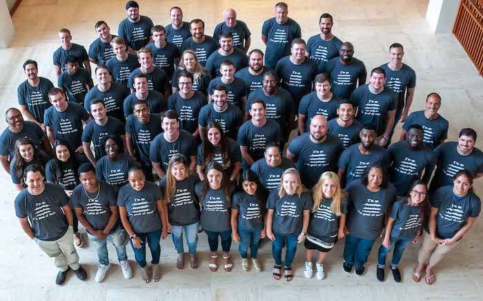 The early LeaseQuery team gathered in its Atlanta office