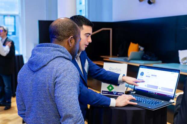 A Physis product demonstration on a laptop at Fintech Sandbox Demo Day