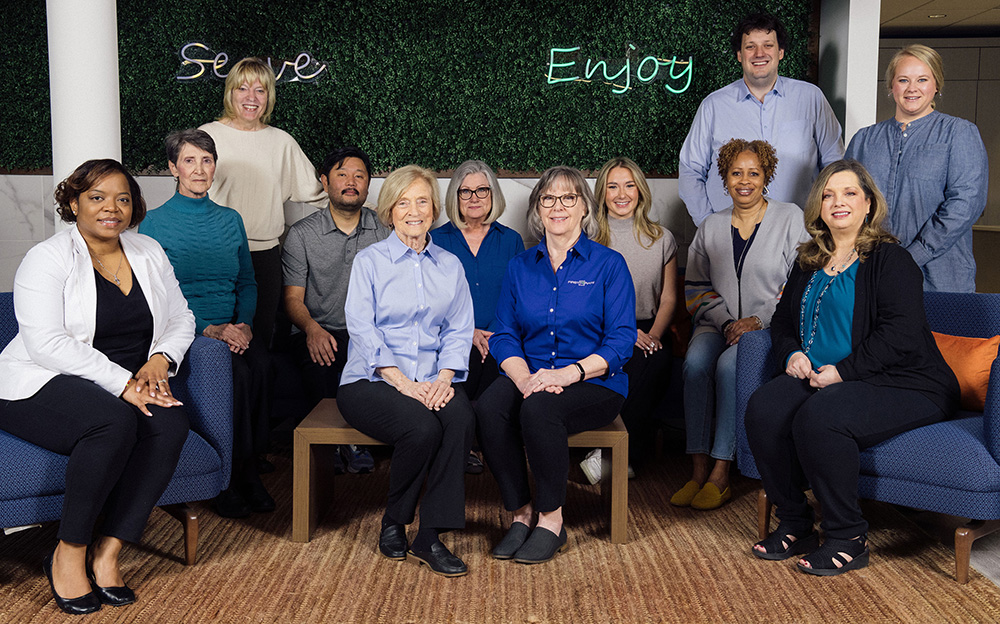 Members of First Rate’s corporate team gathered at the office