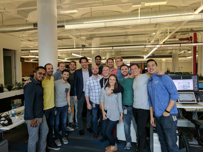 Fizz Ahmed with Google colleagues in an office