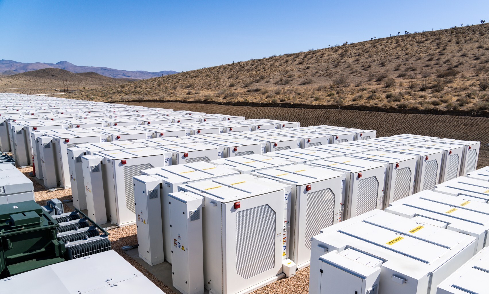 Rows of white Fluence battery storage cabinets at an outdoor installation