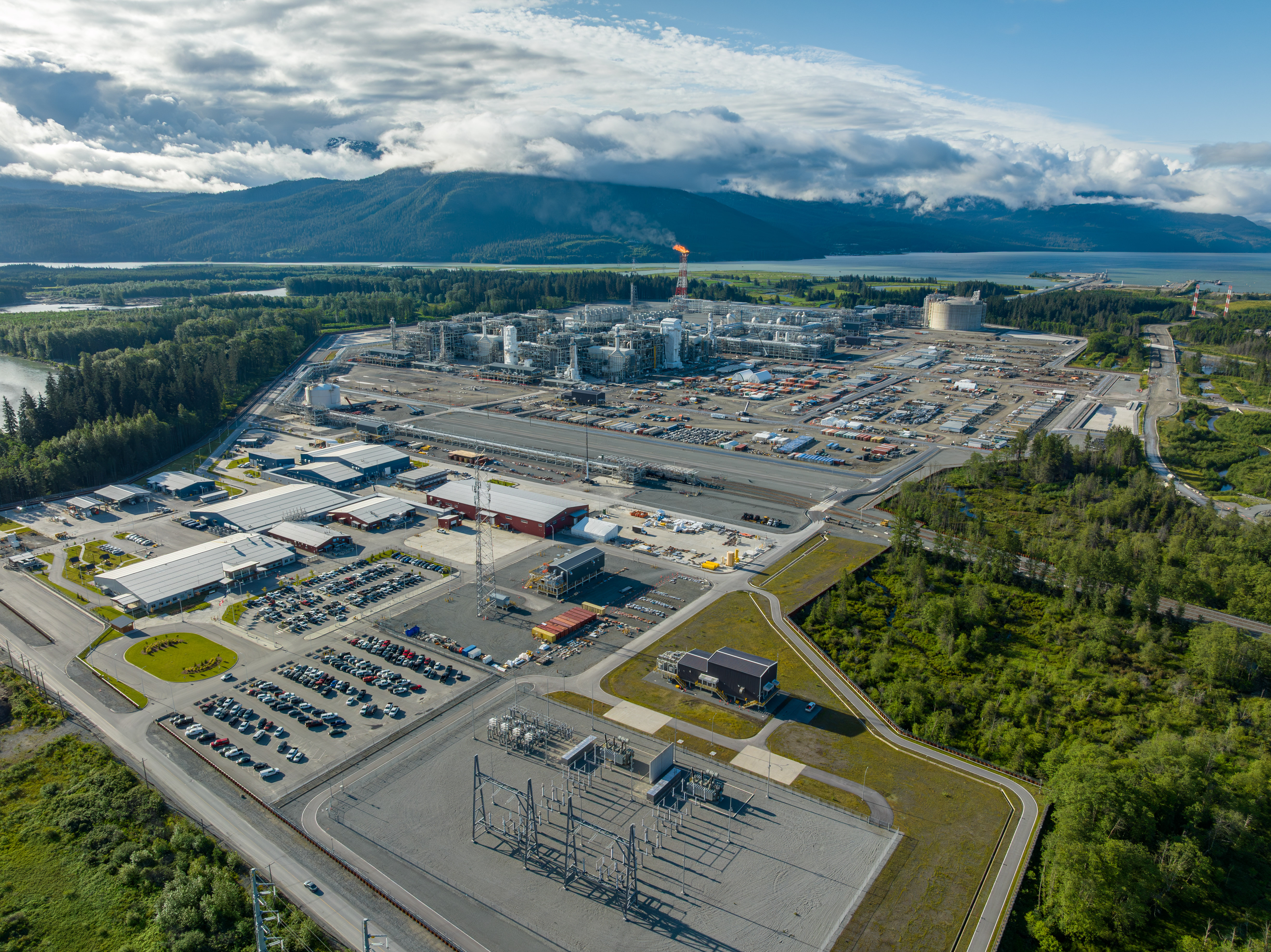 Aerial view of LNG Canada’s processing units, storage tank and surrounding landscape at Kitimat