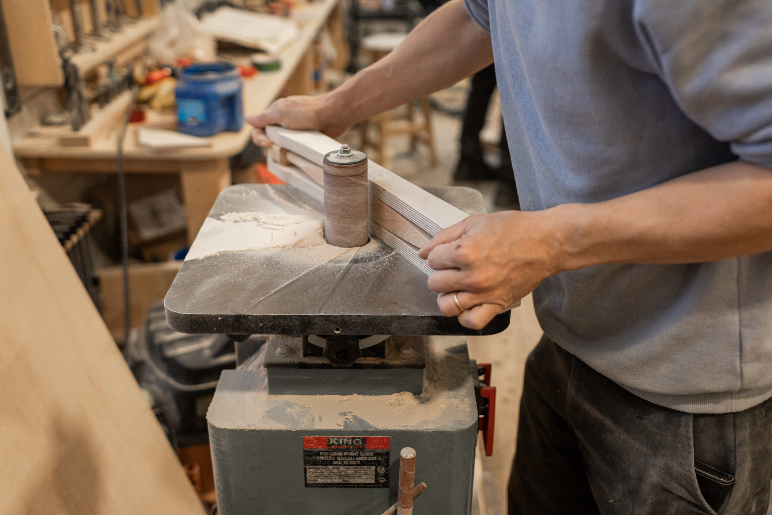 A craftsperson making a wooden chair for Fogo Island Workshops