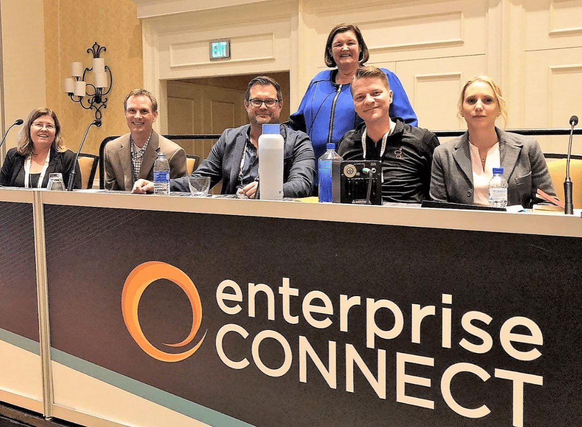 Folia Grace seated with fellow cloud contact-center leaders during an Enterprise Connect panel