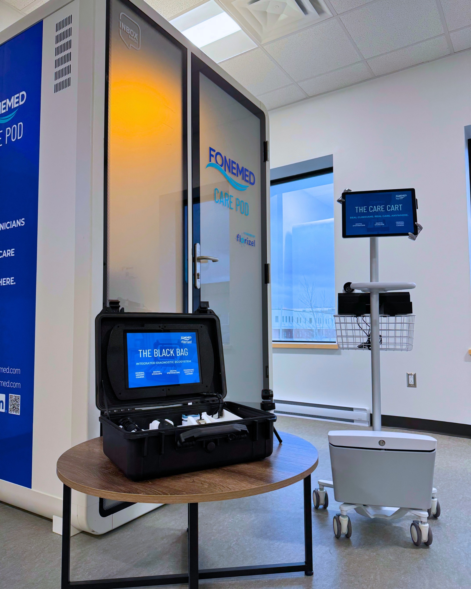 FONEMED Care Pod, open Black Bag diagnostic kit, and Mobile Care Cart