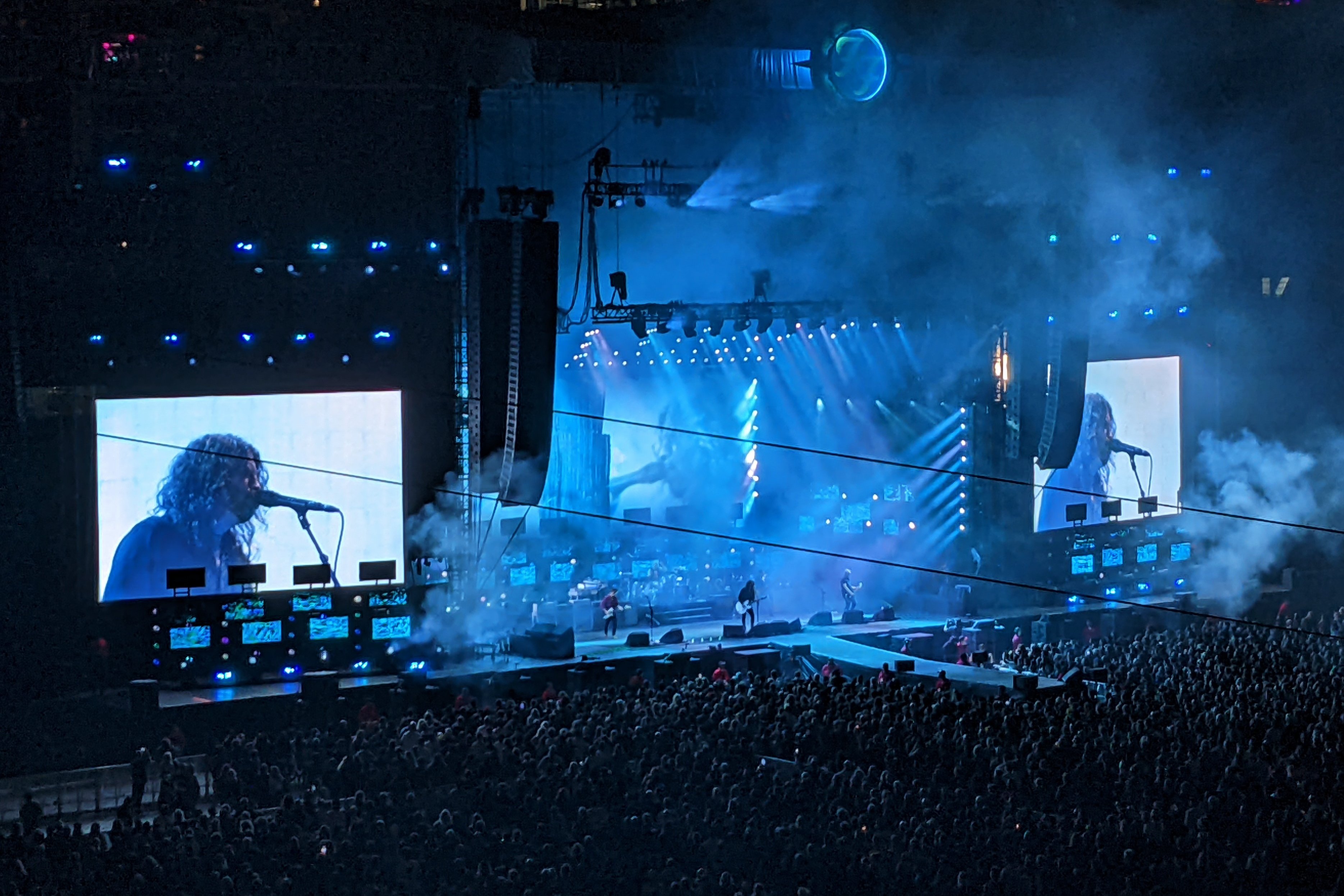 Foo Fighters performing on a large outdoor stage at Petco Park in San Diego in 2024