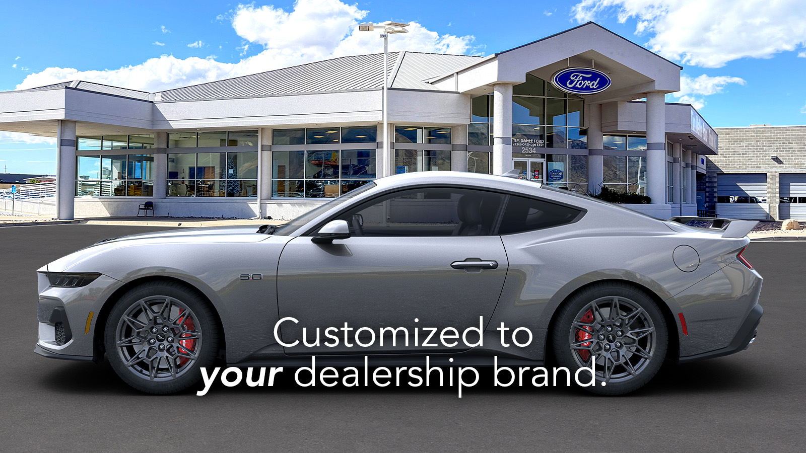 VINReal promotional rendering of a silver Mustang placed in front of a Ford dealership