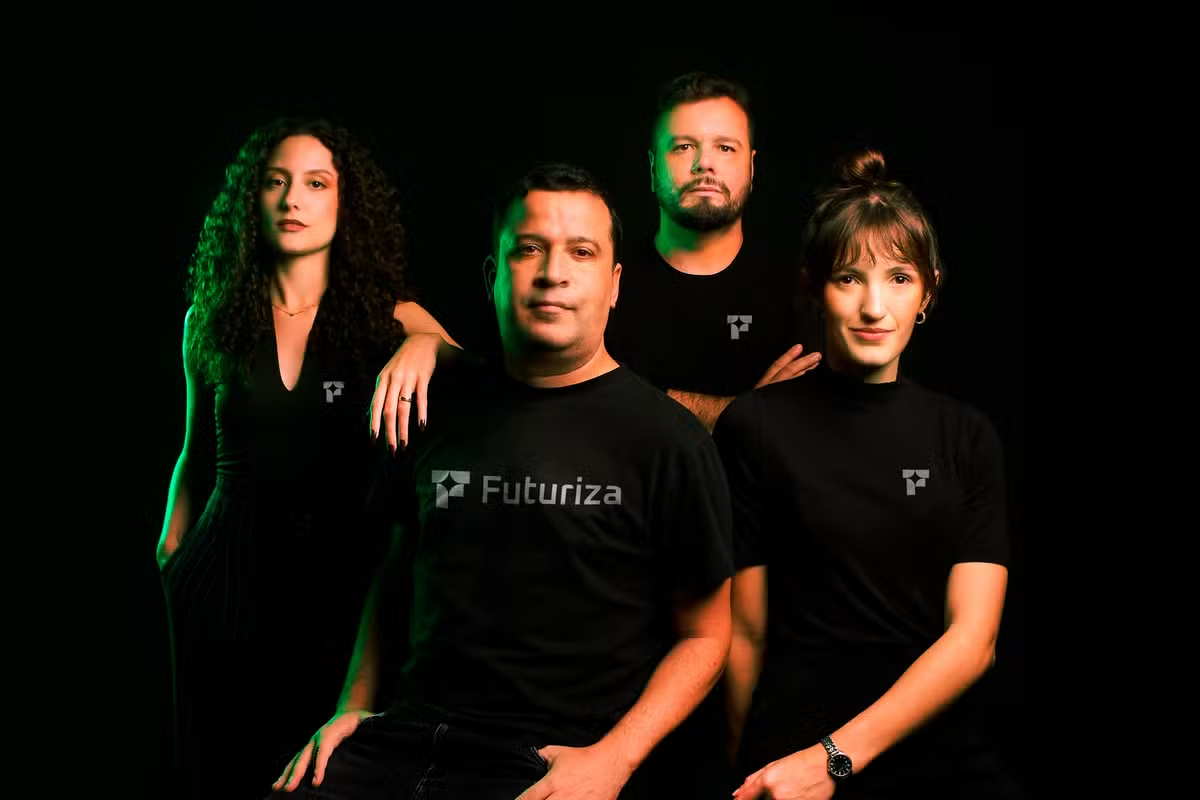 Four members of the Futuriza team in a studio portrait