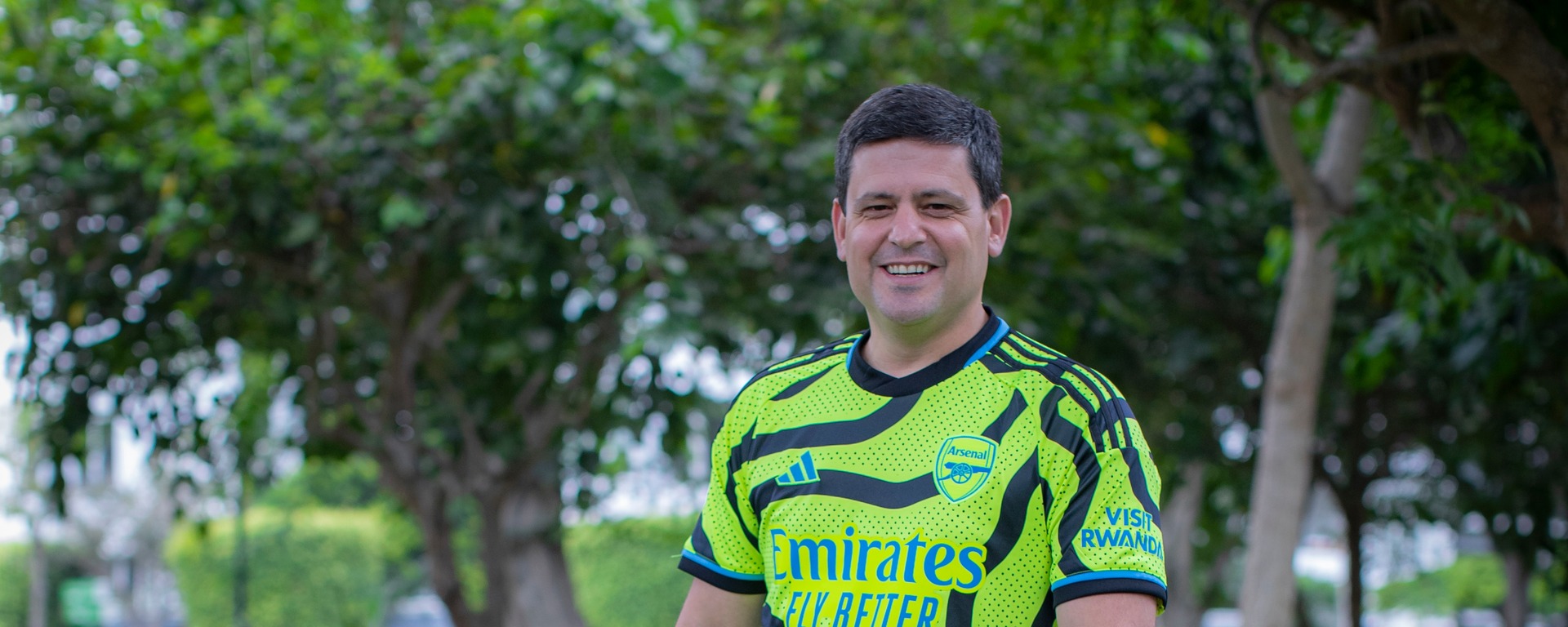 Francisco Rodríguez Larraín outdoors in a bright football shirt
