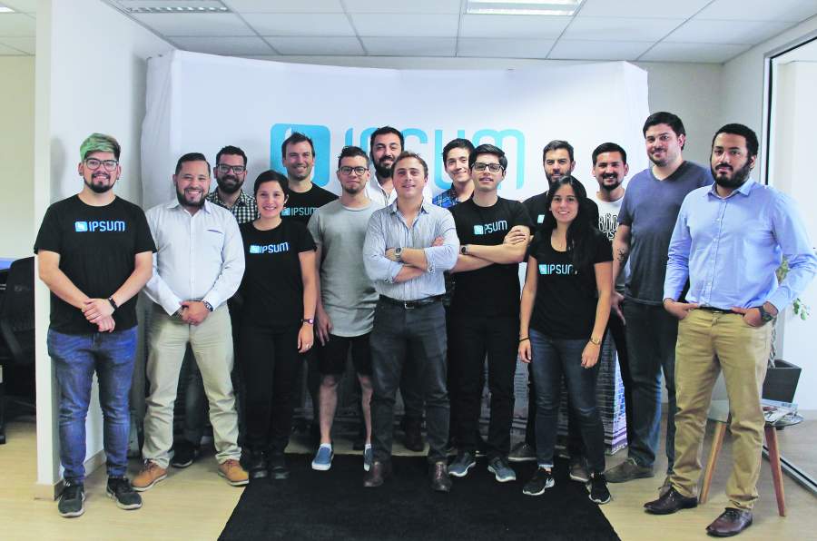 Franco Giaquinto standing with the Ipsum team in Santiago