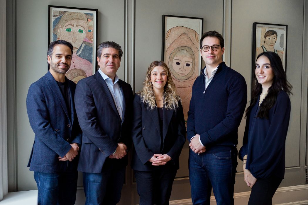 Five members of Diagram’s ClimateTech team standing together in an office