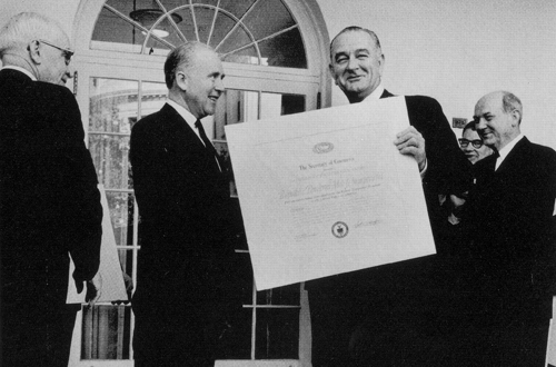 Archival group photograph at the 1964 White House presentation of Republic Powdered Metals’ export award