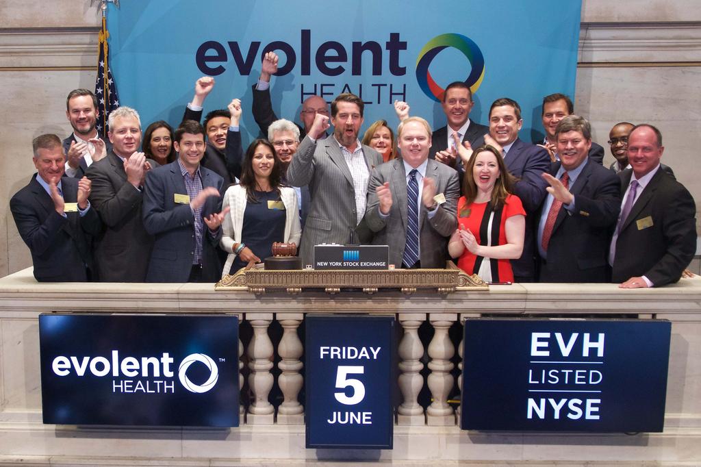 Frank Williams and Evolent colleagues applaud at the New York Stock Exchange listing celebration