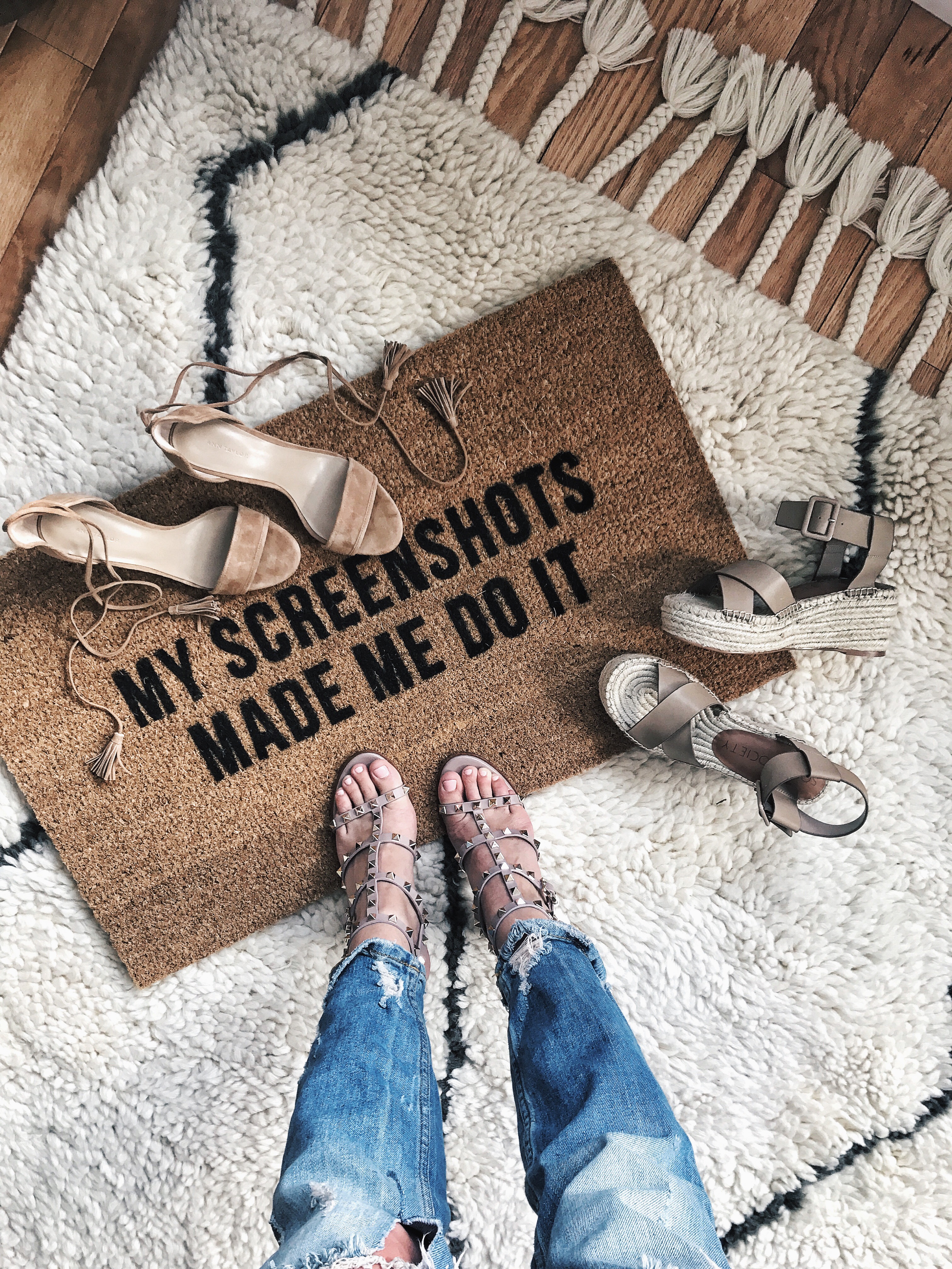 Sandals beside a doormat reading My screenshots made me do it, in a 2017 LIKEtoKNOW.it launch photograph