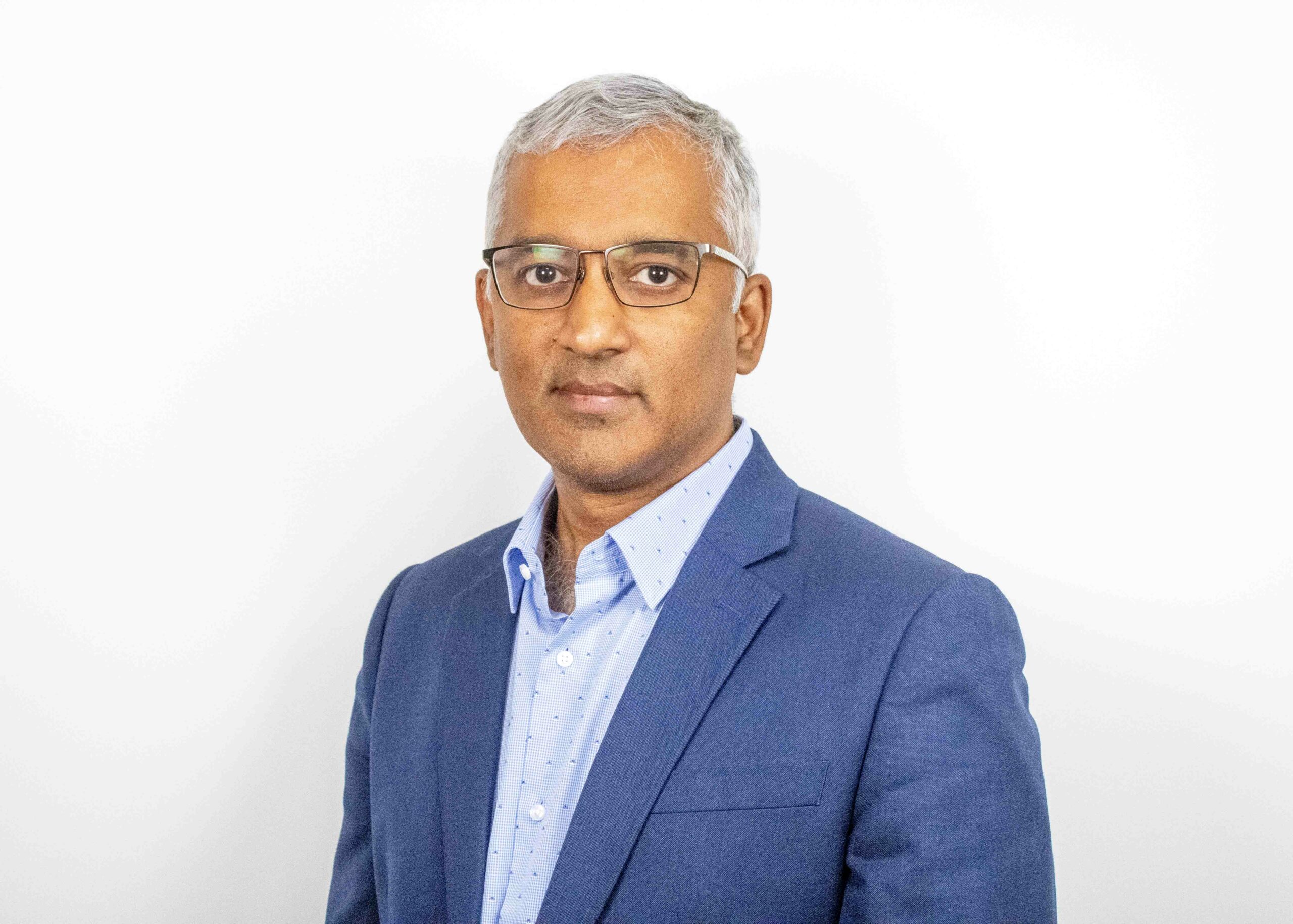 Freespace founder and CEO Raj Krishnamurthy in a blue jacket