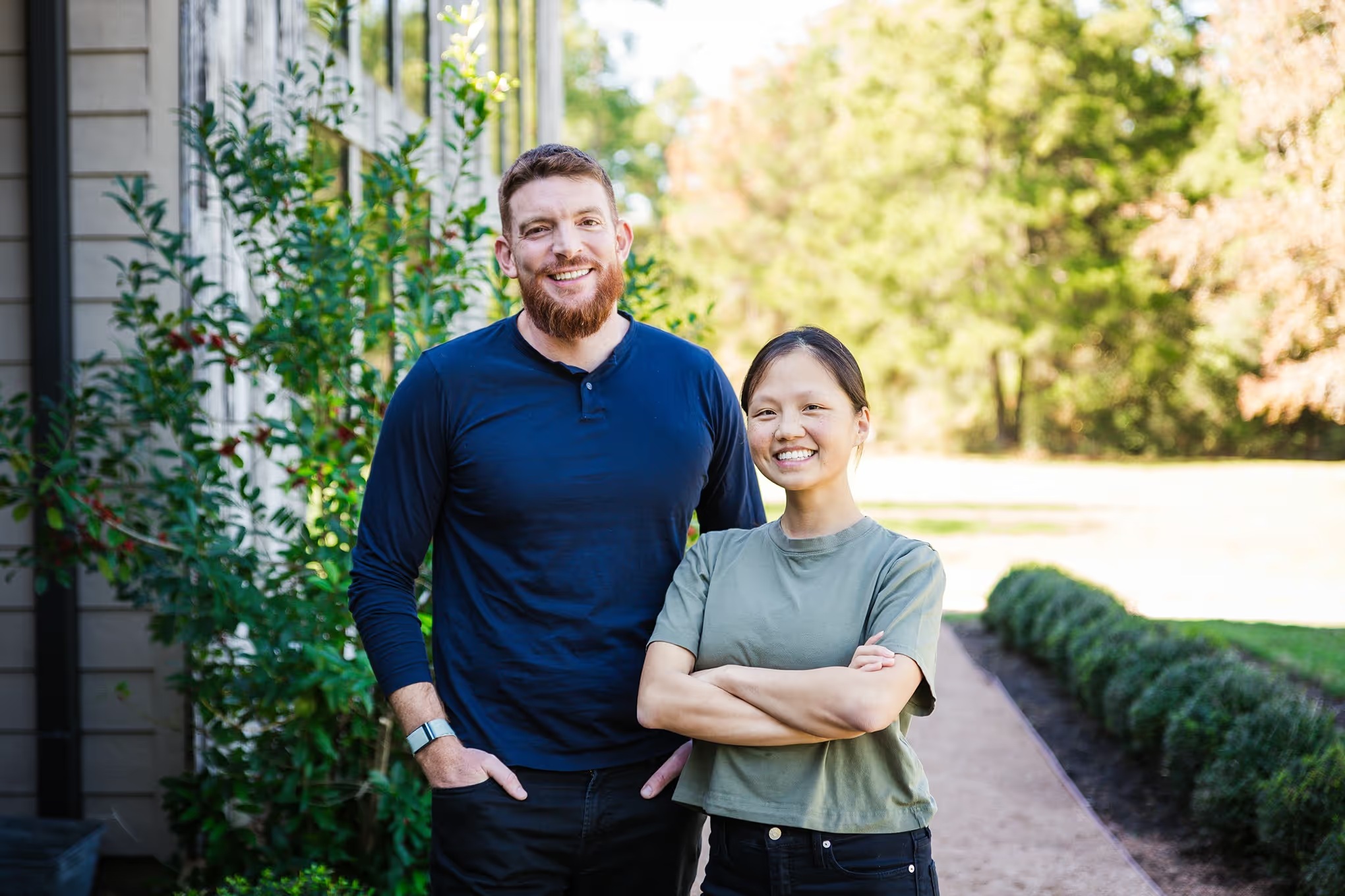 FreeWill co-founders Jenny Xia Spradling and Patrick Schmitt standing together