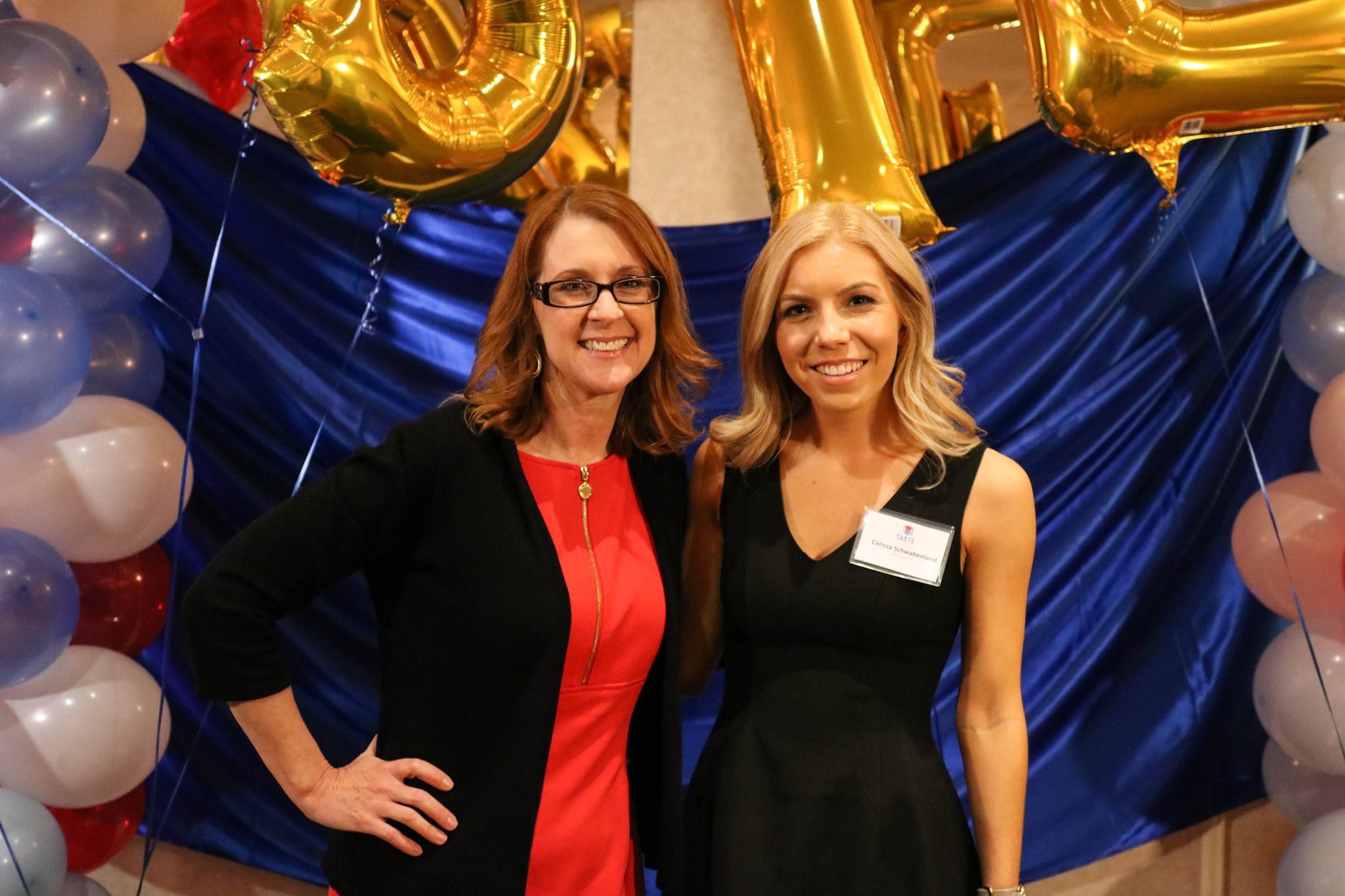 Professor Betsy Hays and TASTE 2016 student CEO Carissa Schwabenland standing together at the event.