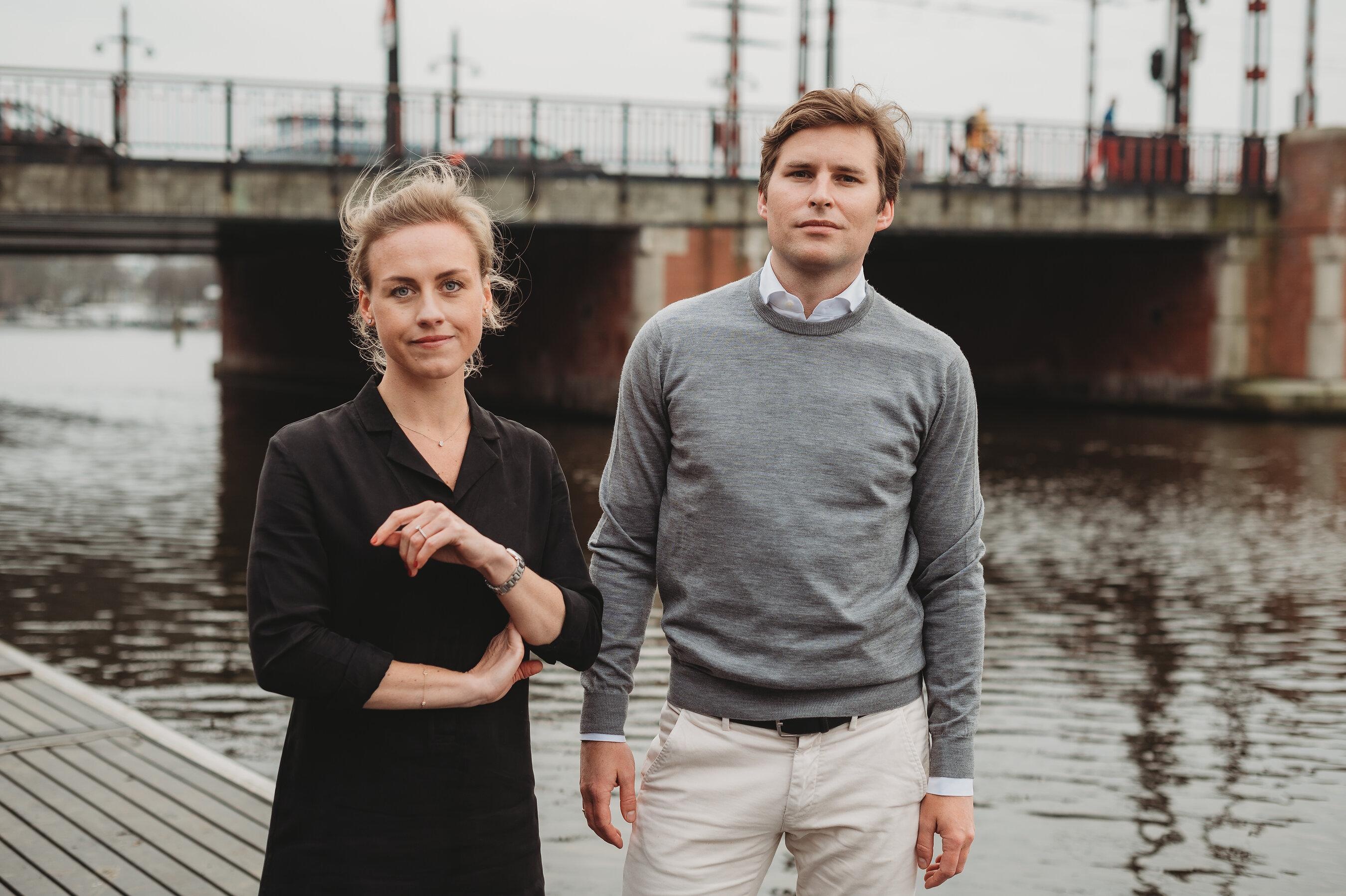Gain co-founders Nicola Ebmeyer, left, and Frister Haveman standing beside a waterfront