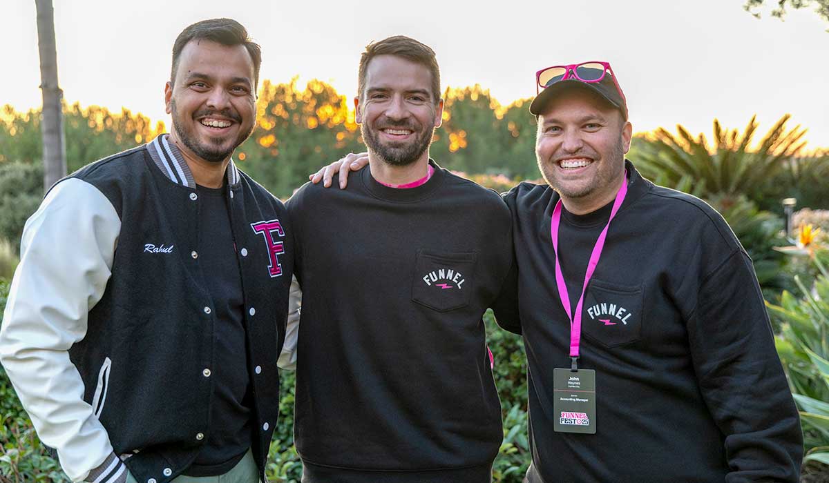 Three Funnel team members together at an outdoor company gathering