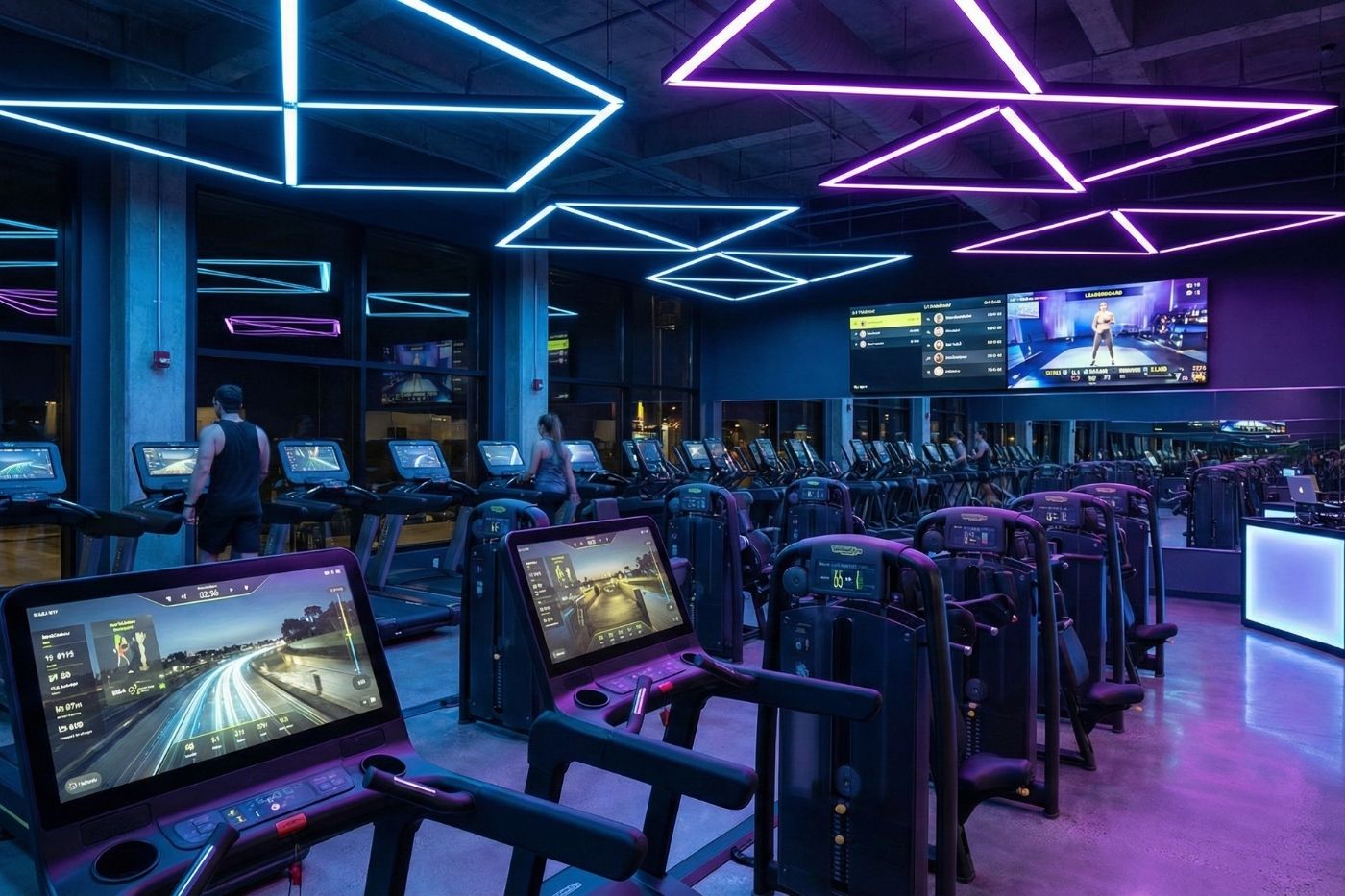 Modern fitness facility interior with integrated audio and video systems